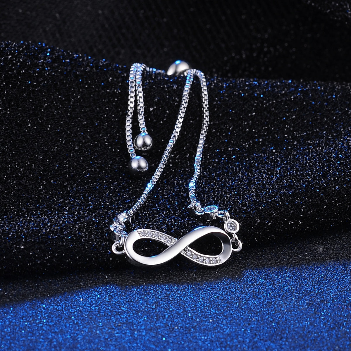 Pulsera Infinity con Diamantes — Oro y Plata