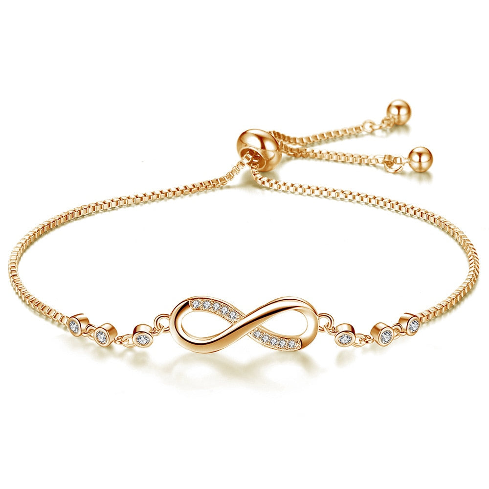 Pulsera Infinity con Diamantes — Oro y Plata