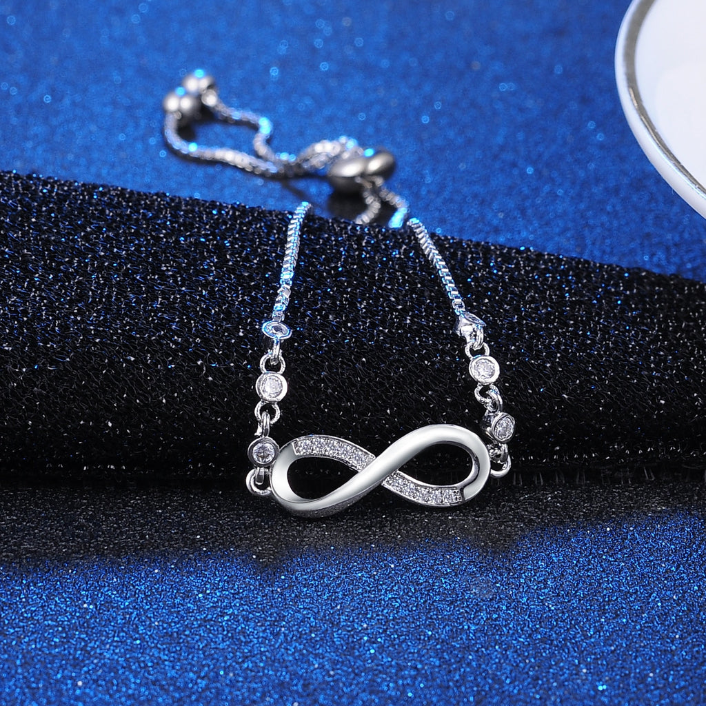 Pulsera Infinity con Diamantes — Oro y Plata