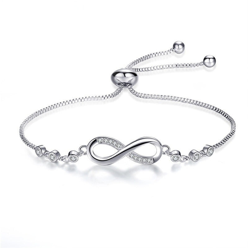 Pulsera Infinity con Diamantes — Oro y Plata